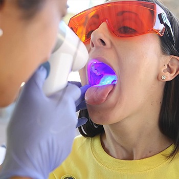 Patient receiving oral cancer screening