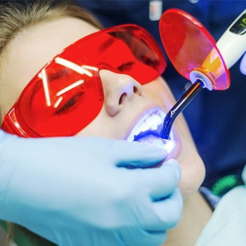 Patient receiving dental bonding