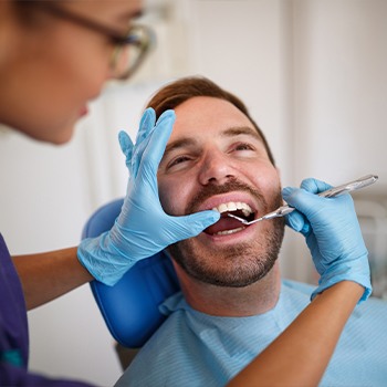 Man receiving dental exam