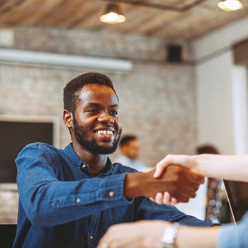 person smiling in a job interview