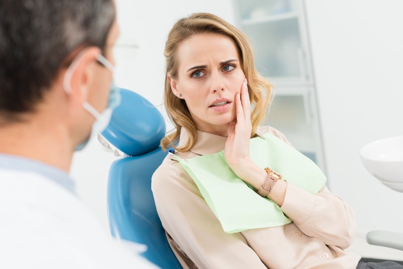 Female patient concerned at dentist