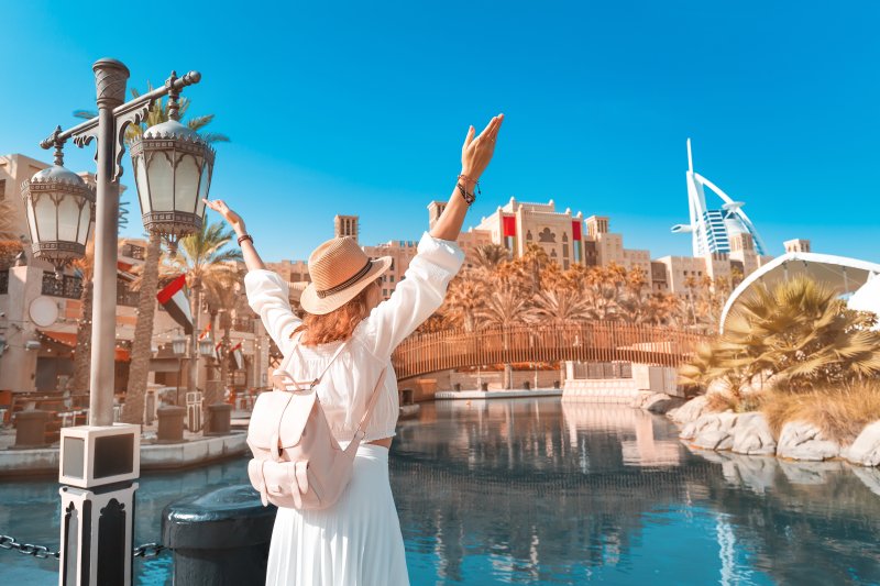 Excited woman sightseeing on vacation